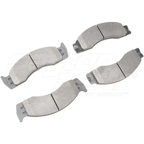Automann D411 front semi-metallic brake pad showing the textured brake lining and metal backing plate.