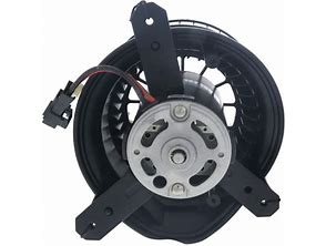 Automann 830.21214BE HVAC blower motor for IHC Behr, showing the compact cylindrical design with electrical connectors.