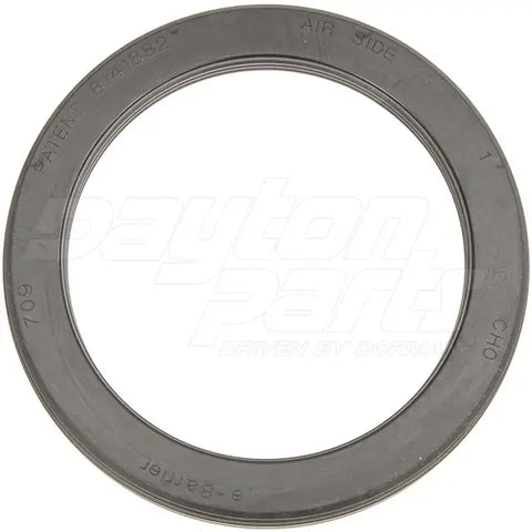 Automann Chicago Rawhide Classic Style wheel seal with rubber exterior and metal core, designed for automotive wheel protection.