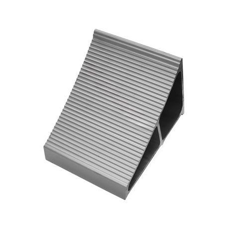 Automann wheel chock with 9.813 x 7 x 8 inches size, designed to secure vehicle wheels and prevent movement.