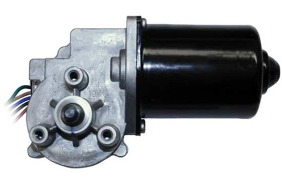 Automann wiper motor for USPS LLV vehicle, model 577.99901, shown installed on a truck windshield with wiring connections visible.