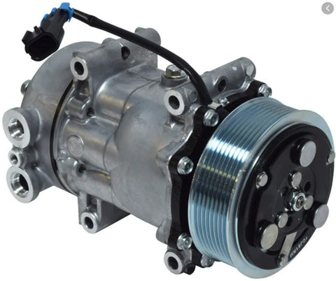 Automann 830.31006 air conditioning compressor 7H15 type, showing the metal body and mounting brackets of the automotive air compressor.