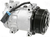 Automann 830.31018 Air Conditioning Compressor 7H15 type, showing metallic compressor unit with hoses and fittings.