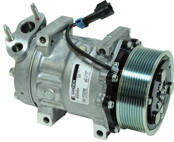 Automann 830.31035 air conditioning compressor 7H15 type, showing the metallic cylindrical component with mounting points.