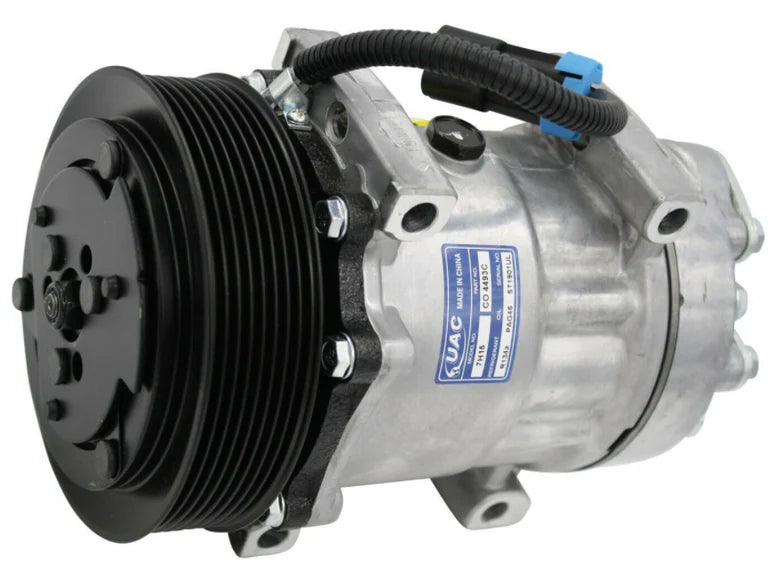 Automann 830.31039 Air Conditioning Compressor 7H15 type, showing the compact, metallic air compressor with mounting brackets.
