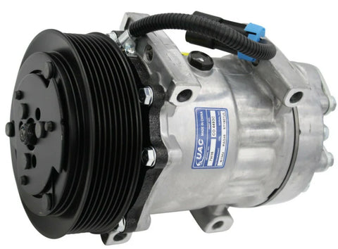 Automann 830.31039 Air Conditioning Compressor 7H15 type, showing the compact, metallic air compressor with mounting brackets.