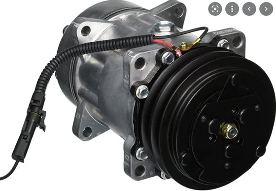 Automann 830.31066 air conditioning compressor 7H15 type, showing the compact automotive air compressor in a neutral setting.