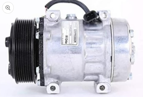 Automann 830.31082 air conditioning compressor 7H15 type, showing metal body and connecting ports for vehicle cooling system