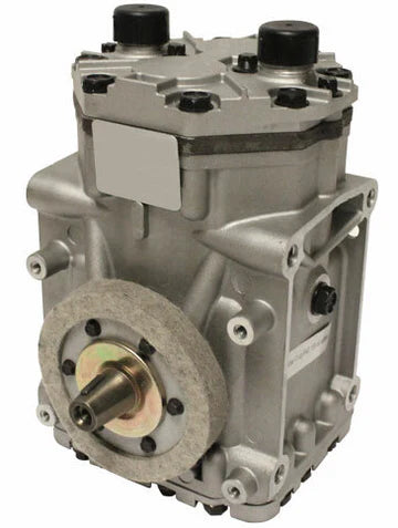 Automann 830.31106 Air Conditioning Compressor ET210L type, showing the metallic compressor unit with hoses and electrical connections.