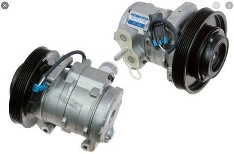 Automann 830.31303 air conditioning compressor 10S15C type, showing the cylindrical metal compressor with mounting points.