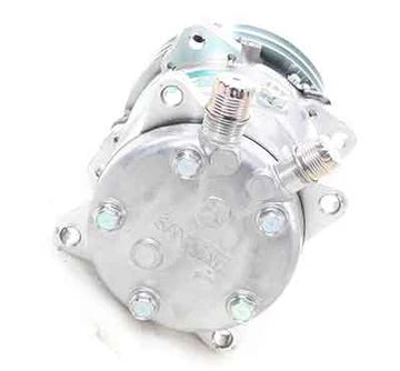 Automann 830.31401 TM15 air conditioning compressor, automotive air compressor with detailed metal components and fittings.
