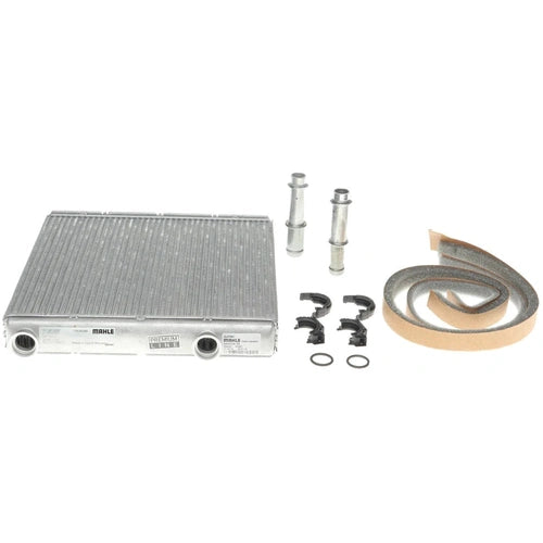 Automann 830.47110BE heater core for IHC Behr heavy-duty trucks, showing metal fins and inlet/outlet connections.