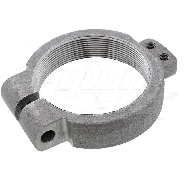 Automann E677-MCK223 Mack suspension spindle nut shown on a vehicle suspension system.