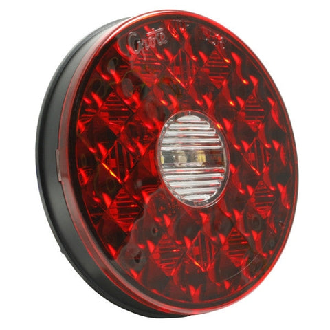 Automann 571.LD40RW14-S/T/T back-up LED light and 4-inch lighting fixture with red and white LEDs, mounted on a vehicle.