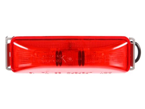Red marker light kit by Automann, 1-1/4 inch by 4 inch, for vehicle lighting, shown in the image.