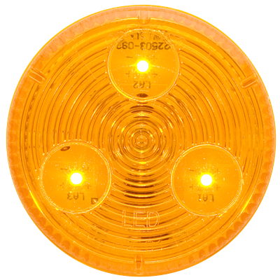 Automann 571.LD30A3-Marker Light LED 2-inch amber signal light on a vehicle, showcasing bright amber LED illumination.