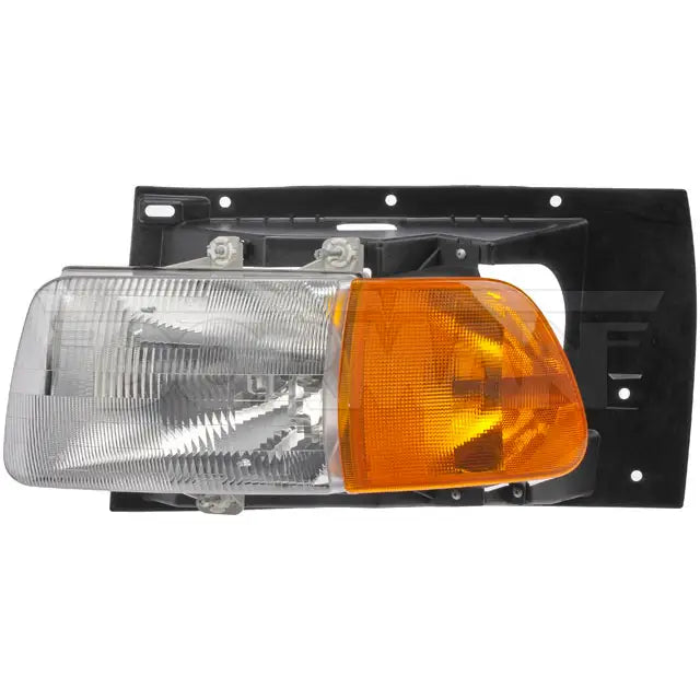 Dayton heavy duty left headlight for vehicles, showcasing a durable automotive headlight with clear lens and robust housing.